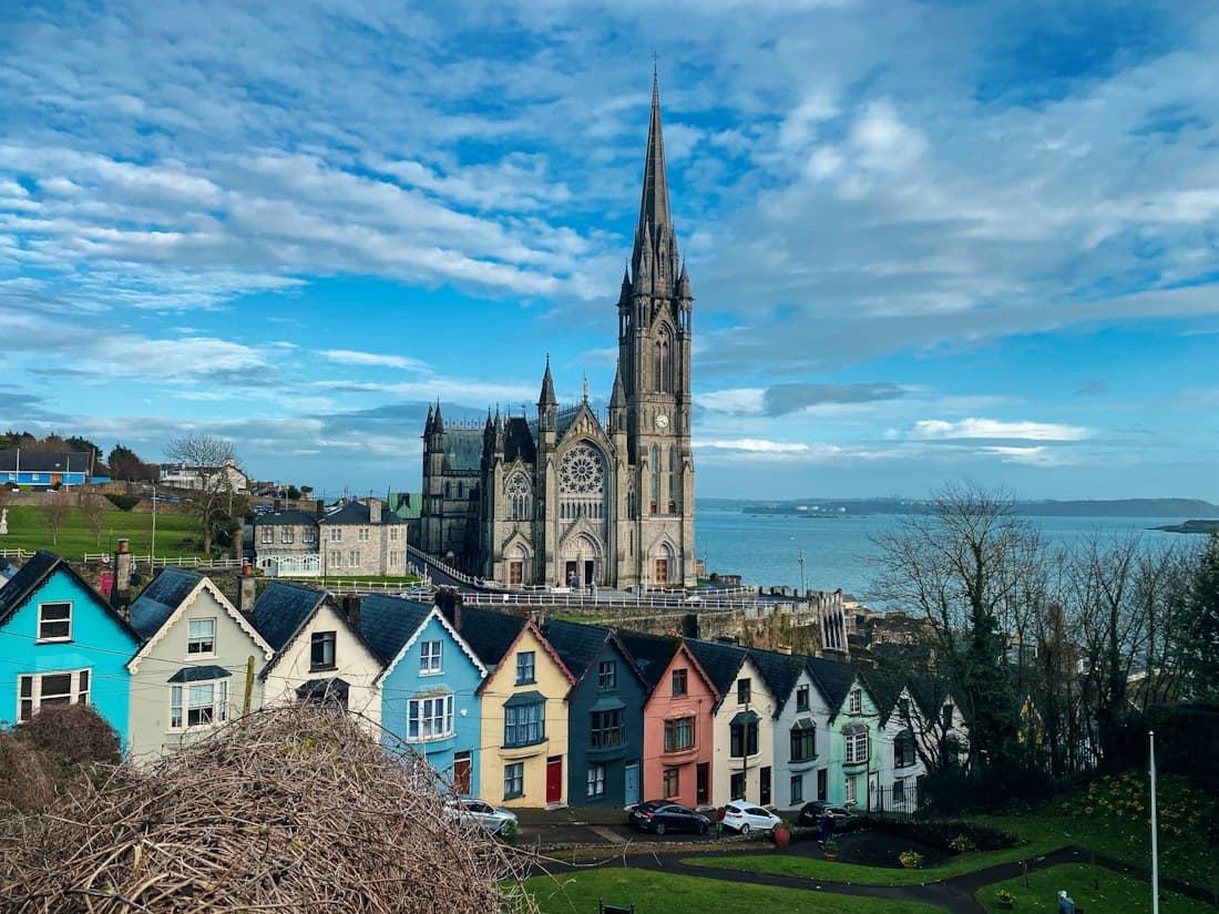 Colourful houses and St Colman’s Cathedral in Cobh, Ireland